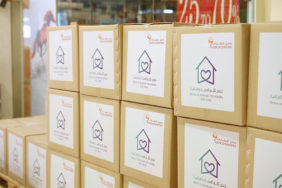 wasl Properties distributes food boxes in Naif, Al Ras